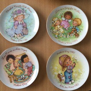 Four 1981-1984 mother's day plates exclusively crafted in Japan for Avon Canada
